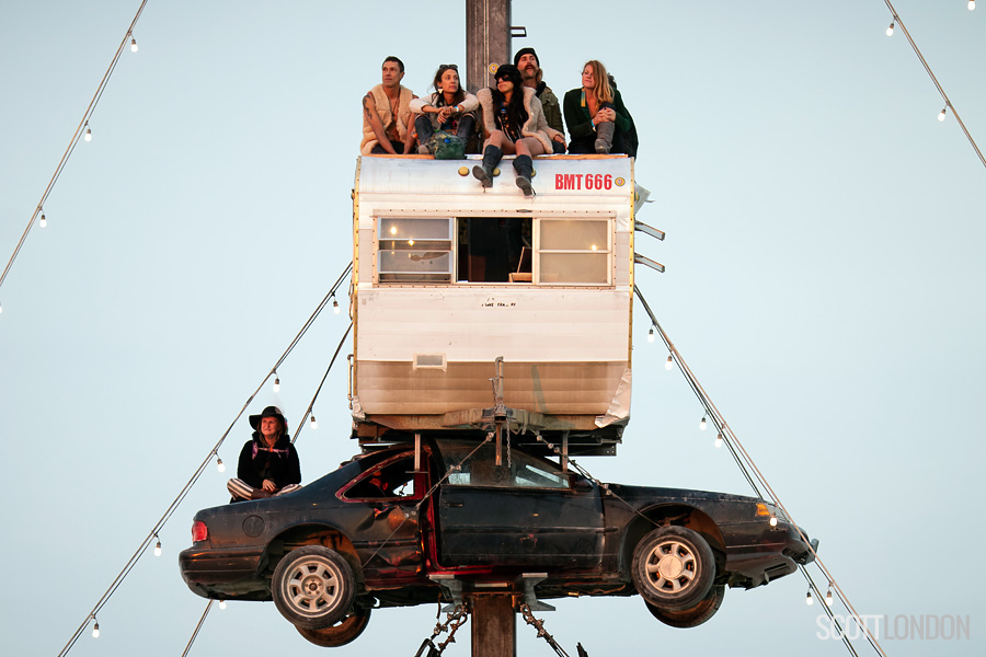 Burning Man participants take in the sunrise from 'Night at the Climb In', an installation by Reno artist Dustin Weatherford at Burning Man 2018