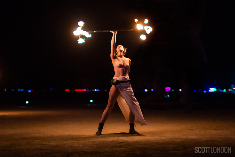 A fire-dancer puts on a show at Burning Man 2018. (Photo by Scott London)