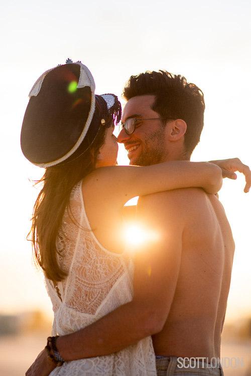 A candid moment with Johanna and JB, two Burners from France at Burning Man 2018. (Photo by Scott London)